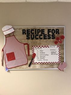 a wooden sign that says recipe for success with an apron and spatula on it