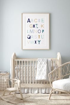 a baby's room with a rocking chair, crib and pictures on the wall