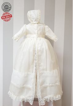 Beautiful classic Spanish christening baby unisex gown made with high-quality materials to commemorate an unforgettable day. Includes GOWN (dress) + BONNET (hat) Made of high-quality ivory organza (you can choose white from the drop-down). Adorned with lace to the shade of the dress. The gown is fully lined with soft, toned cotton fabric to provide baby comfort. Removable satin bow at the waist Includes matching hat/bonnet as a perfect addition to baby's entrance into Church. Also lined. It is t Elegant Cream Organza Baptism Dress, Elegant Organza Baptism Dress, Fitted Cream Organza Baptism Dress, Cream Fitted Organza Baptism Dress, Classic Cream Baptism Dress For Wedding, Elegant Cream Baptism Dress For Church, Baby Christening Dress, Wedding Outfit For Boys, Boy Baptism Outfit