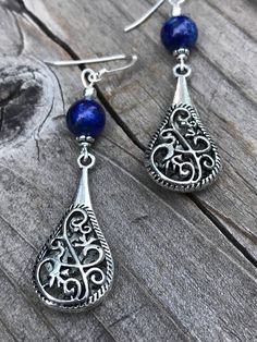 Lapis Lazuli antique silver filigree teardrop earrings.These lightweight filigree earrings have a beautiful teardrop shape that is very elegant. The lapis lazuli gemstones have a beautiful rich blue color that looks really great with the antique silver.The filigree teardrops are very light weight as the design is hollow. Material is silver plated pewter. These earrings are 2 1/4 inches long and a half inch wide. They are very light weight, only 2.9 g each.French ear wires are high-quality sterli Silver Lapis Lazuli Pierced Earrings, Elegant Silver Lapis Lazuli Earrings, Elegant Silver Earrings With Lapis Lazuli, Fork Jewelry, Jewelry Organizer Diy, Earrings Gemstone, Filigree Earrings, Homemade Jewelry, Silver Filigree