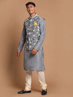 VASTRAMAY Men's Grey Printed Nehru Jacket And kurta With Cream Pyjama Set Add a touch of elegance to your ethnic wear collection with this grey printed Nehru jacket, kurta, and cream pyjama set from VASTRAMAY. The jacket features a mandarin collar and a button closure, while the kurta is adorned with a stylish print. The cream pyjama completes the traditional look. Perfect for festive occasions and special events, this set offers comfort and style. Features: Grey printed Nehru jacket Stylish pri Cotton Nehru Jacket For Eid, Unstitched Nehru Jacket With Long Sleeves, Unstitched Long Sleeve Nehru Jacket, Nehru Jackets, Grey Prints, Hot Outfits, Mandarin Collar, Pajama Set, Pajamas