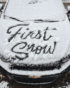 a car covered in snow with the words frost storm written on it's hood