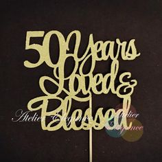 a 50th birthday cake topper with the words 50 years food and blessing on it