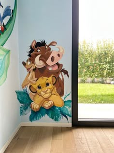 the lion and the lamb wall decal is next to a door