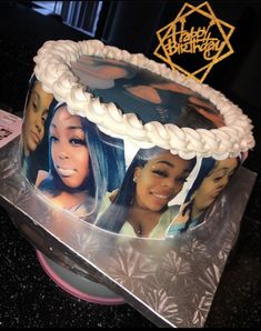 a birthday cake with pictures of women on it