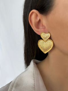 Hand Made Heart earring Heart-shaped Clip-on Earrings For Valentine's Day, Heart Shaped Clip-on Earrings For Gift, Single Heart Earring For Wedding, Elegant Handmade Heart Earrings For Valentine's Day, Handmade Elegant Double Heart Earrings, Heart Beads Drop Earrings For Anniversary, Handmade Double Heart Earrings For Party, Handmade Heart Earrings For Wedding, Gold Heart Beads Earrings For Party