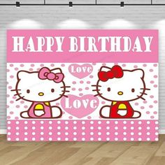 a hello kitty birthday party backdrop with polka dots