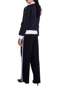 Maje celebrates a sporty summer with a capsule that fuses technicality and modern elegance. For the occasion, the studio reinterprets the codes of athleisure to create a sporty-chic wardrobe that is both structured and relaxed  This zip-up tracksuit jacket has a sporty look, with "Club" and "Saint Honoré Sport" embroidery on the front and tricolour side stripes with the Clover logo along the sleeves. Featuring a stand-up collar and two pockets, it has a contrasting ribbed trim.  Go for a head-to Sporty Track Jacket For Spring Workwear, Clover Logo, Sporty Summer, Chic Wardrobe, Tracksuit Jacket, Favorite Daughter, Maternity Shops, Loungewear Shorts, Sporty Chic