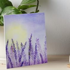 a watercolor painting of purple flowers on a white background with the sun in the distance