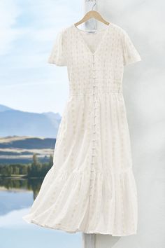 Light and airy, this dress makes summer magic with boho-inspired details. A spirited jacquard pattern creates beautiful depth, while a smocked bodice adds comfort and texture.