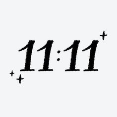 the numbers 11 11 are written in black ink on a white background with cross marks