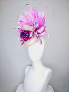 From the 2024 Featured Milliner of the Kentucky Derby Museum  Gorgeous Kentucky Derby hat fascinator  kentucky derby hat fascinator light pink blush beige sinamay with purple rose and pink purple feathers and  purple violet velvet leaves headband attachment each hat is totally one of a kind! no two are alike! I can probably add feathers, flowers etc to existing hats for a small fee. I cannot remove anything from existing hats. Just message me and see if we can make it work! :) I cannot make cust Purple Feathered Headpieces For Kentucky Derby, Purple Mini Hats With Feathers For Kentucky Derby, Purple Feathered Mini Hats For Kentucky Derby, Purple Headpiece With Handmade Flowers For Kentucky Derby, Purple Handmade Flowers Headpiece For Kentucky Derby, Purple Feathers, Velvet Leaves, Light Pink Blush, Derby Hats Fascinators