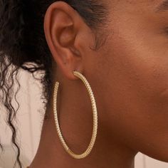 Introducing our “Large Eternity Hoop Earrings in Yellow Gold” these pave hoops feature stones throughout the full hoop. They are our biggest size and make the ultimate statement hoops, perfect to rock this summer, especially since they are waterproof and sweat-proof. Style with our best selling 3mm Tennis Necklace for the perfect look! This product is guaranteed for life – GLD will repair or replace the item should you experience any defects in craftsmanship or breakage. *Earrings sold in pairs* Tennis Necklace, Vermeil Jewelry, Custom Earrings, Sweat Proof, Large Earrings, Single Earring, Pendant Bracelet, Drop Necklace, Chain Pendants