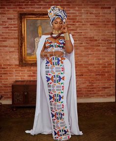 Such a beautiful maxi dress made with love in Nigeria.  It is a hard to ignore dress made to add beauty to any woman who want to look stunning. It can be used as wedding dress, cocktail dress, engagement dress, Prom dress, ceremony, birthday party dress, etc. This  piece is made of crepe fabric and African wax with zipper at the back for easy wear. *Please include Your height to aid Us in predicting the suitable length for the dress* LAUNDRY GUIDE -wash with a mild soap -do not bleach -do not ma Ndebele Lobola Outfits, African Cape Dress, Maasai Dress Designs For Ladies, African Design Dresses South Africa, Lobola Outfits Woman Dresses Zimbabwe, Zulu Traditional Wedding Dresses South Africa, Modern Ndebele Traditional Attire, Umemulo Outfits, Ruracio Outfits For Ladies Kikuyu