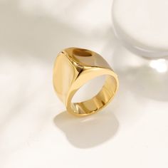 Durable and stylish, our waterproof ring is crafted for both functionality and fashion. Perfect for any occasion, it's the ideal accessory for those who appreciate durability and timeless elegance. Perfect for the minimalist and a beautiful piece to layer with. A true versatile statement piece that you can wear straight from the pool to dinner! - 18K gold plated / stainless steel - Waterproof technology Modern Adjustable Dome Ring For Everyday, Minimalist Stainless Steel Signet Ring, Trendy Wide Band Open Ring For Everyday, Modern Stackable Rings With Thick Band For Gift, Elegant Everyday Metal Rings, Modern Stackable Rings With Thick Band As Gift, Modern Thick Band Stackable Rings As Gift, Modern Rose Gold Open Dome Ring, Modern Open Dome Ring In Metal