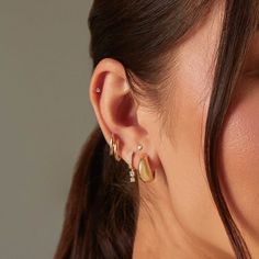 The Gold Dome Huggie Earring is a unique spin on a traditional huggie, thanks to its dome-like silhouette. Crafted from 14k gold, this huggie is perfect for everyday wear and looks just as good in the lobe as it does higher up the ear. Gold Huggie Cartilage Earrings In Fine Jewelry Style, Gold Plated Huggie Cartilage Earrings, Gold Plated Fine Jewelry Huggie Earrings With Polished Finish, Hypoallergenic Gold Plated Huggie Earrings, 14k Gold Huggie Cartilage Earrings, Yellow Gold Huggie Cartilage Earrings, Fine Jewelry Gold Plated Drop Huggie Earrings, Gold Plated Huggie Jewelry, Gold Plated Drop Huggie Earrings Fine Jewelry