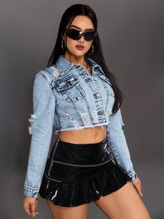 Ripped Long Sleeve Denim Jacket For Streetwear, Ripped Grunge Denim Jacket, Blue Long Sleeve Grunge Denim Jacket, Grunge Denim Jacket For Spring, Edgy Medium Wash Denim Jacket, Grunge Denim Blue Denim Jacket For Spring, Spring Grunge Denim Blue Denim Jacket, Trendy Frayed Hem Denim Top For Fall, Trendy Fall Denim Top With Frayed Hem