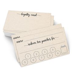 two business cards with handwritten words on them, one for each card and the other for numbers