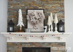 a fireplace with some decorations on top of it