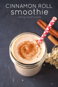 a smoothie in a glass with cinnamon on top