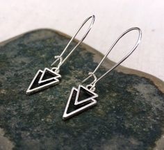 "Mod minimalist geometric earrings. Dainty yet striking! Perfect for everyday, year round wear. They measure 5/8\" long by 3/8\" wide and hang from 1\" silver kidney style ear wires that lick and match. Made from allergy free plated silver. Thanks so much for stopping by! Please take a moment and visit the rest of my Etsy shop. I have many more unique jewelry designs to choose from. Lots of great gift ideas too! 🌸 Tiger Flower Jewelry 🌸 🌸 Inspired by Nature 🌸" Adjustable Geometric Minimalist Earrings, Adjustable Minimalist Geometric Earrings, Tiger Flower, Dainty Dangle Earrings, Small Silver Earrings, Arrow Earrings, Bird Earrings, Bird Jewelry, Earrings Dainty