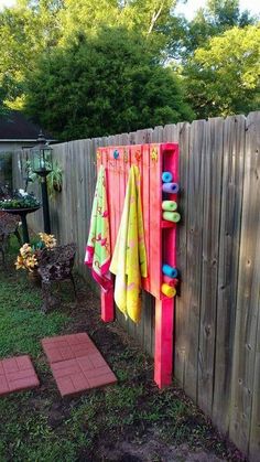 an image of a towel rack in the backyard