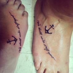 two people with tattoos on their feet and one has an anchor, the other is a cross