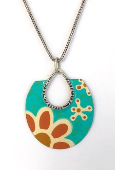 FLOWER POWER! A silver teardrop with hammered detail is soldered to brass in the shape of an oval. The metalwork is oxidized and tumbled to soften the finish.   Heat cured patinas in turquoise, rusty orange and ivory have been applied and coated with clear enamel.  The pendant includes your choice of an oxidized sterling silver box chain in 16, 18, or 20 inches. Please specify.  Shipped in earth friendly, recycled, and often repurposed packaging. Thank you for shopping small! Namaste Metal Teardrop Jewelry With Patina, Teardrop Metal Jewelry With Patina, Rusty Orange, Rectangle Earrings, Spiral Earrings, Silver Box, Pretty Earrings, Oxidized Sterling Silver, Earth Friendly