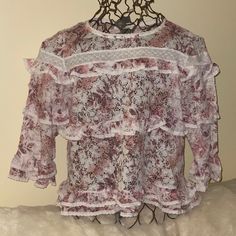 New Anthropologie Shabby Chic Lovely Matilda Floral Ruffled Lace Blouse Balance This Blouse Delicate Ruffles With Distressed Denim Or A Utilitarian Skirt. New With Tags Size L 20" Pit To Pit 21.5" Length Color White & Pink Nylon, Spandex, Polyester Ruffled Detail 3/4 Sleeves Pullover Styling Hand Wash Imported Anth#269 Ruffled Blouse For Garden Party, Feminine Ruffled Tops For Garden Party, Feminine Ruffle Tops For Garden Party, Feminine Long Sleeve Tops For Garden Party, Lace Floral Print Tops For Daywear, Lace Tops With Floral Print For Daywear, Feminine Ruffled Blouse For Brunch, Pink Ruffled Lace Top, Pink Lace Top With Ruffles