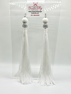 Our handcrafted all white nylon tassel earrings are perfect for making a bold statement. Woven from 100% Nylon thread and stunning beads, each earring features a 5-inch drop from the ear lobe. Made with quality materials like nickel-free, stainless steel, or hypoallergenic findings, you can trust that they are designed for maximum comfort and durability. Limited edition beads give it a unique touch, and custom lengths and colors are also available to match your individual style. Please add note before you check out if you would like them shorter than 5 inches from the ear lobe.   ALL EARRINGS ARE MADE TO ORDER Individual Style, All White, Tassel Earrings, Jewelry Earrings Dangle, Etsy Earrings, Tassels, Dangle Drop Earrings, Dangle Earrings, Limited Edition