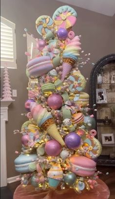 an ice cream cone decorated christmas tree in a living room