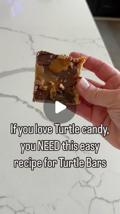 someone holding up a piece of food with the caption if you love turtle candy, you need this easy recipe for turtle bars