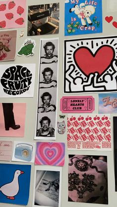 a refrigerator covered in magnets and stickers with pictures on the fridge door to spell out love