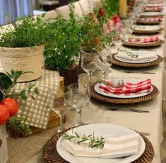 the table is set with place settings for dinner guests to sit down and enjoy their meal