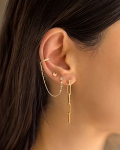 Add a touch of bold elegance to your style with our 14K Gold Paper Clip Chain Stud Earrings. These statement earrings are both elegant and edgy, creating a unique and eye-catching look. The long dangle design adds a touch of drama, making these earrings a must-have for any fashion-forward individual. Sold as a Pair Total Weight: Approx. 1.7 grams Drop Length: Approx. 49mm Standard Production: 3-5 business days Rush Order Production: 2-3 business days Shipping: Select shipping method at checkout. Gold Paperclip Chain Drop Earrings, Modern Paperclip Chain Earrings, Yellow Gold Chain Link Earrings For Pierced Ears, Gold Minimalist Metal Clip-on Earrings, Gold Plated Chain Link Earrings, Gold Chain Earrings, Earrings Chain, Vintage Fans, Gold Paper