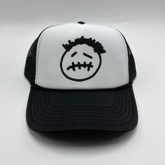 "travis scott cactus jack logo inspired trucker hat printed on a vintage fit trucker snapback cap you will receive: 1 white/black trucker cap (features black puff print) made in lot c. visit us for more music, movies and pop culture \"parking lot style\" custom merch! custom colors available upon request! please inquire beforehand to ensure availability. all orders take 1-2 business days to process and ship. all sales are final. no refunds or exchanges." Punk Style Snapback Hat For Streetwear, Halloween Snapback Baseball Cap For Streetwear, Halloween Snapback Trucker Hat For Streetwear, Adjustable Trucker Hat For Streetwear, Halloween Streetwear Baseball Cap, Adjustable Halloween Hats For Streetwear, Trucker Dad Hat For Streetwear, Streetwear Trucker Hat With Flat Bill, White Snapback Trucker Hat For Streetwear