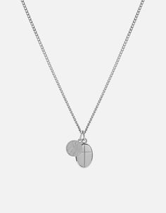 Two is better than one. This men's double pendant in sterling silver is a salute to the higher powers who watch over us. It features a cross within an oval, along with a mini version of our Saint Christopher Surf Necklace, a popularized token worn by the surfing community during the 1960s for protection.Available for monogram personalization. Keyboard Symbols, Two Is Better Than One, Surf Necklace, St Christopher Necklace, Gold Pinky Ring, St Christopher Pendant, Summer Style Guide, St Christopher, Saint Christopher