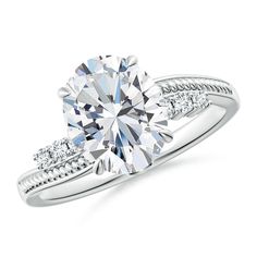 a white gold engagement ring with diamonds on it