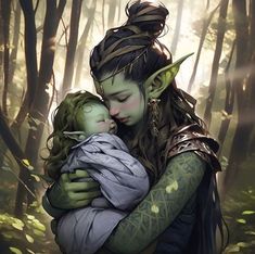 a woman holding a baby in the woods