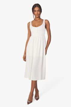 The Whisper White Corset Midi Dress will be your freshest closet staple this summer! Featuring a snug corset bodice and an A-line skirt, this sophisticated scoop neck dress gives off an effortlessly-chic look. Pair it with the Gracen Metallic Mule to elevate your look. Beautiful White Dresses, Corset Midi Dress, Romantic Summer, White Corset, Women Corset, Corset Bodice, Whisper White, White Midi, Scoop Neck Dress