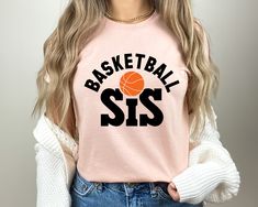 Basketball Sister Shirt, Sports Sis T Shirt, Basketball Sis Shirt, Basketball Sis Short Sleeve T-shirt, Basketball Shirt, Spirit Wear Thank you so much for choosing us! How To Order 1️⃣ Please review all the information provided before placing an order. 2️⃣ Select the shirt type and size using the drop down menu. 3️⃣ Select the color of the shirt using the following drop down menu. 4️⃣ Once all your desired items are in your cart you may complete your order by entering your payment method, desir Sporty Pink Tops With Sublimation Print, Pink Crew Neck T-shirt For Sports Events, Pink Crew Neck Top For Sports Events, Pink T-shirt With Team Name For Sports Season, Pink Graphic Print Sportswear Tops, Pink Sports Tops With Letter Print, Sporty Pre-shrunk Pink Shirt, Pink Tops With Letter Print For Sports Events, Pink Cotton T-shirt For Sports Events