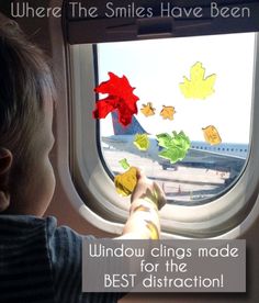 a little boy looking out an airplane window at fall leaves and the words, where the smiles have been