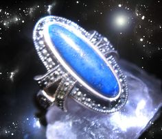 Cassia4's Jewlery ABOUT THE RING: SIZE 7, STERLING LAPIS LAZULI FINE RING Pin by Ilga Stasa on ??? | Photo art, Women, Beautiful WHAT IS KNOWN, IS THAT THIS RING IS ENCHANTED WITH A POTENT EXTREME CHARGE OF MASTER WITCH'S DIVINE NUMBER MAGICK AND IT IS BELIEVED IT HOLDS OVER 900,000X CHARGE OF THESE RARE BLESSED MASTER NUMBERS ENERGIES! THESE RARE NUMBER GIFTS RAISE ALL FREQUENCIES WITH A SECRET SERIES OF MASTER NUMBERS THAT UNLOCK MASTER CHANNELS OF POWER AND BESTOW GIFTS FOR THE ONE WHO CLAIMS Master Numbers, Number Gifts, Witch Gift, Weird Gifts, Healing Touch, Fine Ring, Art Women, Coven, Lapis Lazuli