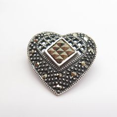 925 Sterling Silver Vintage Real Marcasite Gemstone Heart Pin Brooch Weight: 4.3g WELCOME TO PAWN SHOP We are an actual pawn shop and have been in business for over 25 years. Since 1990, our establishment has been serving a variety of clients by providing them with short term cash solutions and options of liquidity regarding their treasured heirlooms. Acknowledging that today′s customers are very sophisticated and are looking for a variety of investments, our acquisitions are hand-picked for our Zodiac Signs Gemini, Heart Pin, Heart Gemstone, Gemini Zodiac, Pawn Shop, Amethyst Gemstone, Pin Brooch, Hand Picked, Eternity Ring