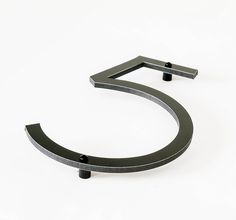 the letter s is made out of metal