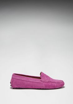 Hugs & Co. pink penny loafer driving shoes for women. Moccasin style driving loafers in luxurious pink suede upper embossed with a Gecko print and lined with a soft leather for extra comfort. Made in Portugal 100% Suede Upper featuring a 100% Leather Lining Rubber studded sole in gum colour