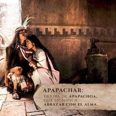 two people dressed in native american clothing sitting on the ground with an old sign that says apapachar