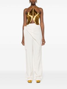 Cult Gaia Quella Draped Metallic Crop Top - Farfetch Gold Crop Top For Evening, Chic Gold Sleeveless Halter Top, Elegant Halter Neck Crop Top For Evening, Elegant Cropped Party Bottoms, Elegant Cropped Bottoms For Party, Chic Fitted Gold Crop Top, Cropped Halter Top For Spring Evening, Formal Sleeveless Crop Top For Summer, Summer Sleeveless Dressy Crop Top