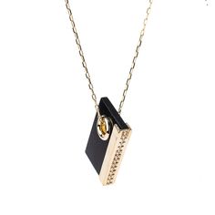 "Turn heads with this Black Onyx crystal necklace with a gold chain. - Black Onyx rectangle Pendant - 18KT Gold Plated Brass - Chain-link micro size chain - Clear Quartz Embellishments - 30\" Necklace Length (includes a 2\" extension chain attached) - Pendant size: 1.5\" H X 1.25\" W x .25\" D BLACK ONYX PURPOSE: Anxiety-soothing, Protection, Love, Boundaries ORIGIN: Brazil CHAKRAS: Root Each necklace comes with a gift box and crystal meaning card. Let's be friends! FOLLOW @interiorsinbalance on Love Boundaries, Black Onyx Crystal, Long Necklace Gold, Free People Necklace, Onyx Crystal, Rectangle Pendant, Black Onyx Necklace, Pave Pendant, Garnet Pendant