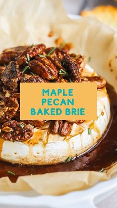 a baked brie topped with pecans and caramel